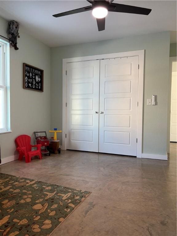 bedroom with a closet and ceiling fan