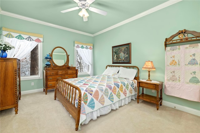 bedroom featuring multiple windows, light colored carpet, ceiling fan, and crown molding