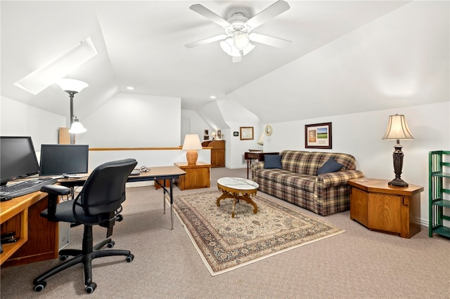 home office featuring light colored carpet, ceiling fan, and lofted ceiling