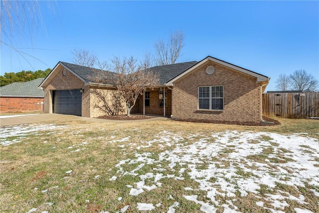 single story home with a yard and a garage