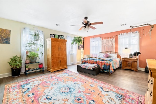 bedroom featuring wood-type flooring and ceiling fan