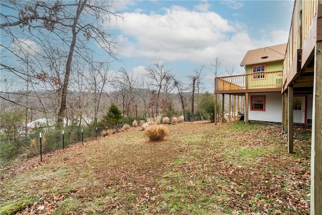 view of yard featuring a wooden deck