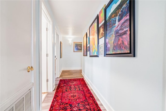 hallway featuring light hardwood / wood-style flooring