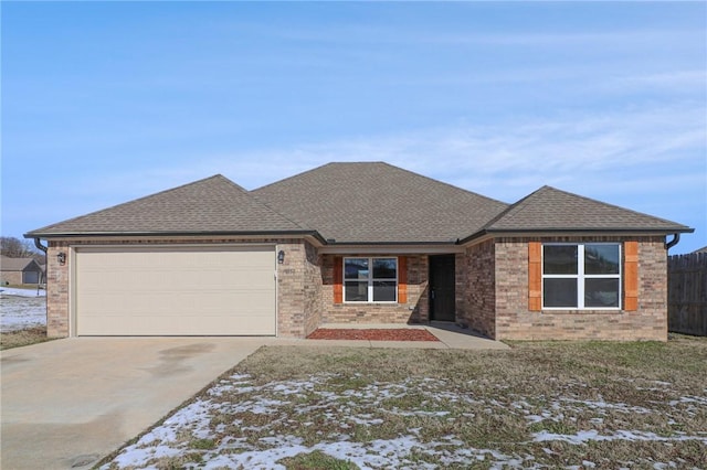 view of front of property with a garage