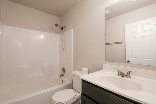 full bathroom featuring toilet, shower / bath combination, and vanity