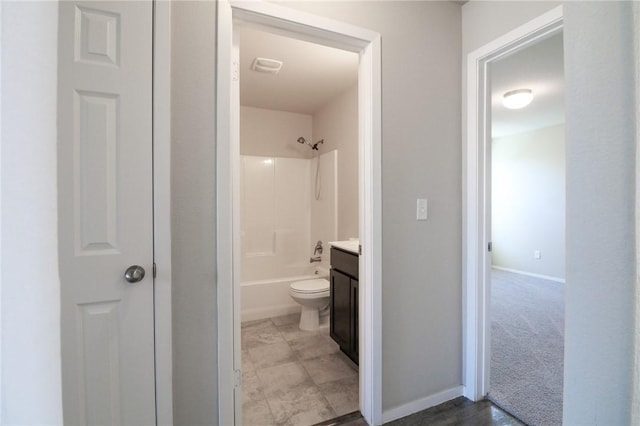 full bathroom featuring toilet, shower / washtub combination, and vanity