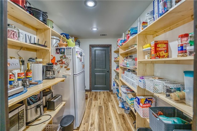 storage area featuring visible vents