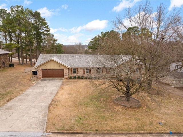 single story home featuring a garage