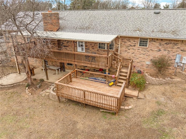 rear view of house with a deck