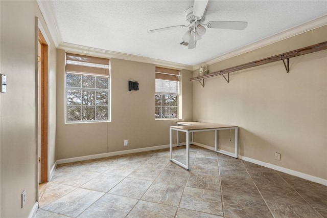 interior space featuring ceiling fan, ornamental molding, and a textured ceiling