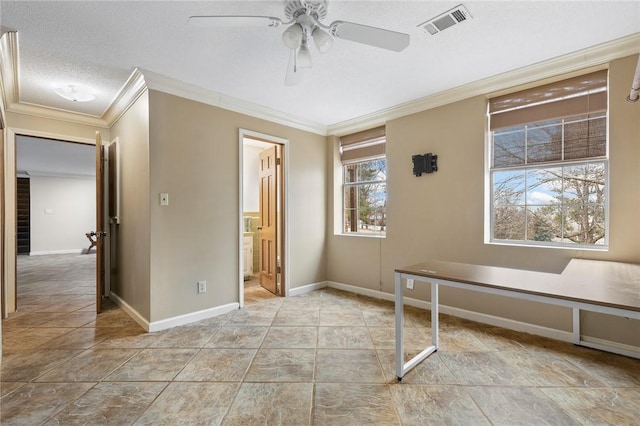 interior space featuring ceiling fan, crown molding, and a textured ceiling