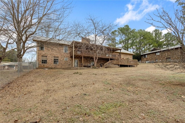 rear view of house with a deck