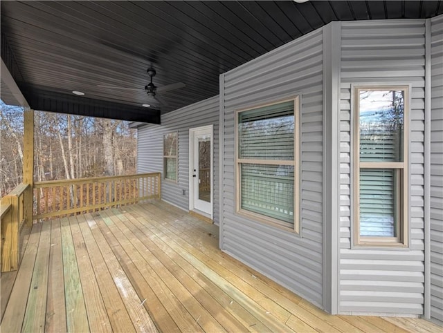 wooden deck with ceiling fan