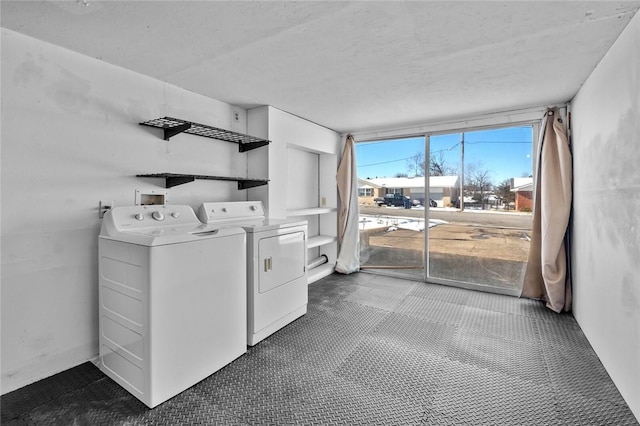 laundry room featuring independent washer and dryer