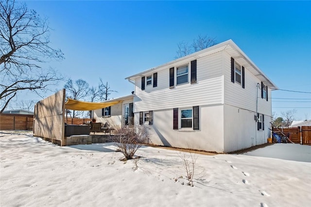 view of snow covered property