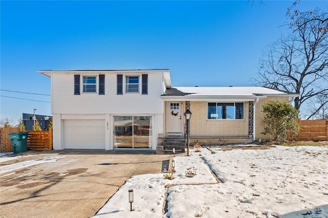 split level home featuring a garage