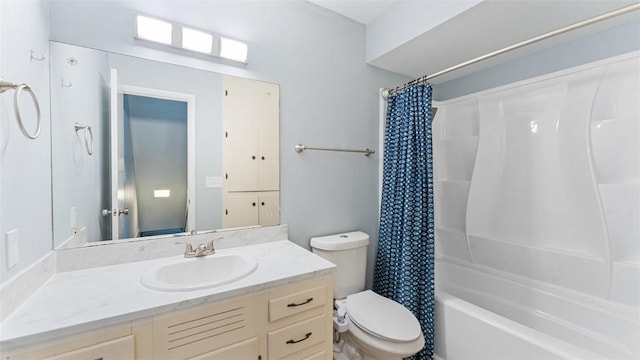 full bathroom with toilet, vanity, and shower / tub combo with curtain