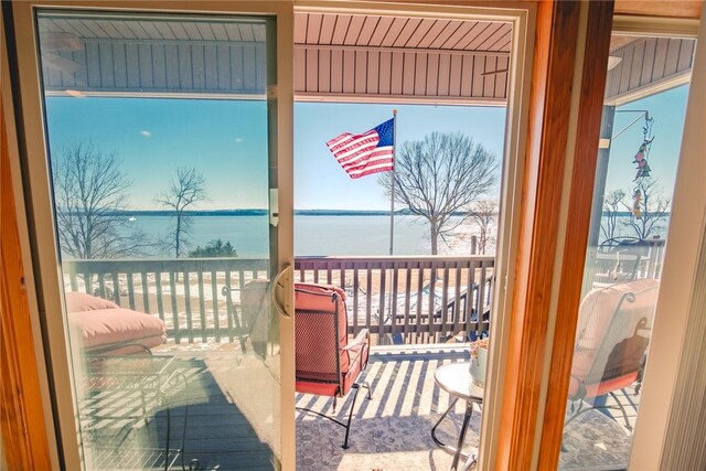 entryway with a water view