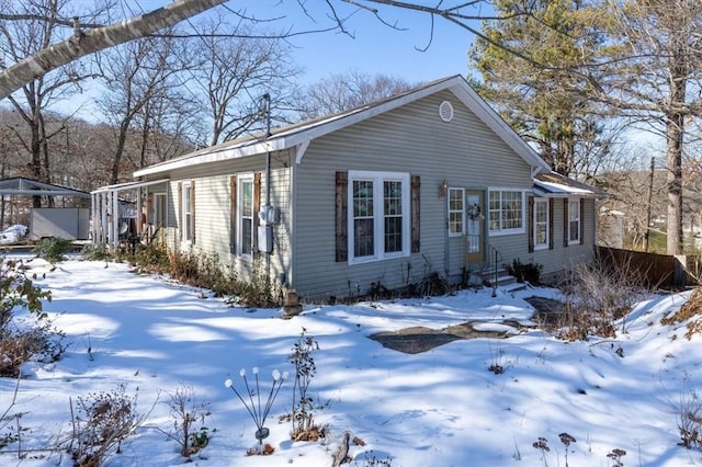 view of snow covered property