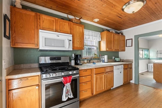 kitchen with sink, wooden ceiling, white appliances, light hardwood / wood-style floors, and crown molding