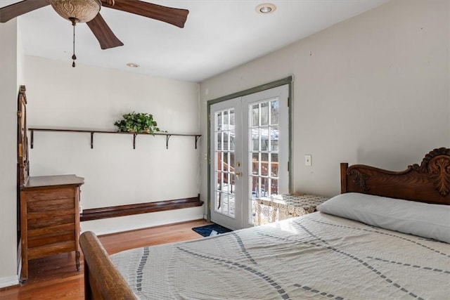 bedroom with french doors, access to exterior, ceiling fan, and light hardwood / wood-style floors