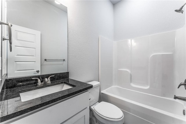 full bathroom with shower / bathtub combination, vanity, and toilet