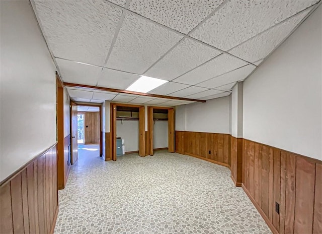 basement featuring a drop ceiling