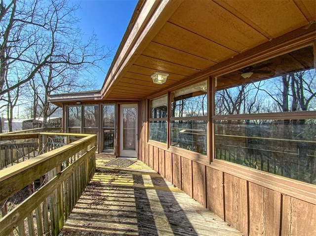 wooden terrace with a sunroom