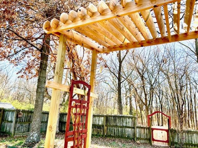 view of play area featuring a pergola