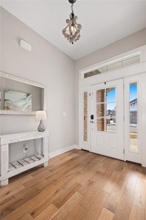 foyer with hardwood / wood-style floors