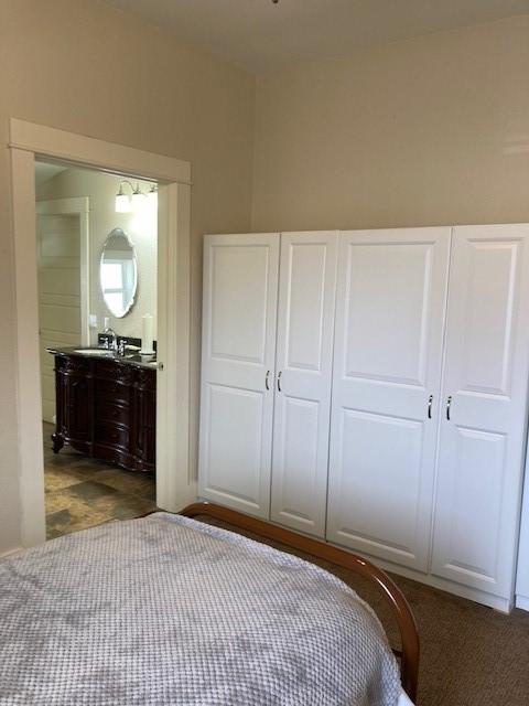 bedroom featuring sink