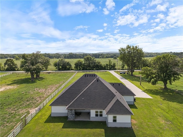 birds eye view of property featuring a rural view