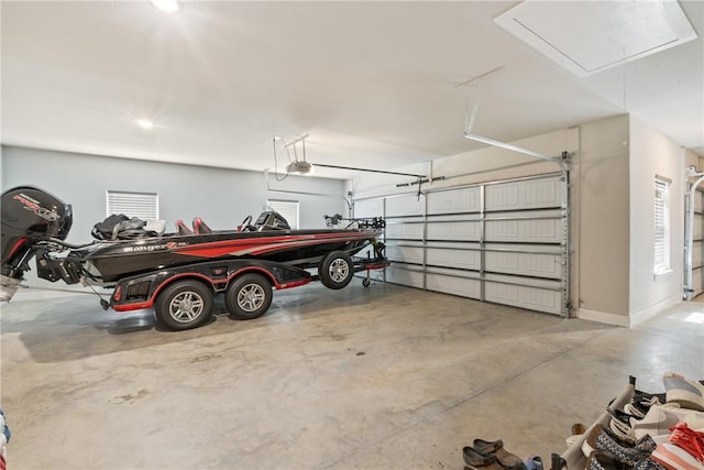 garage featuring a garage door opener