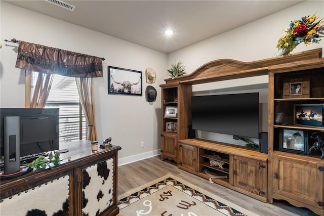 office featuring hardwood / wood-style floors