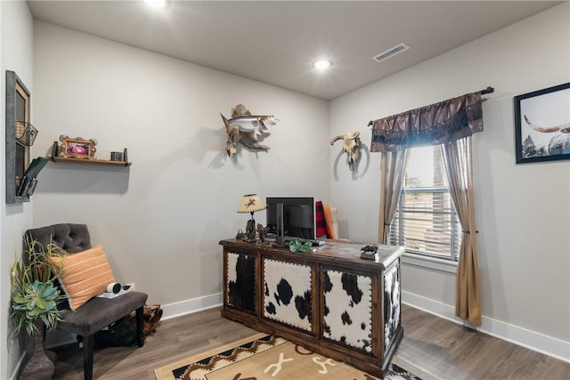 home office featuring hardwood / wood-style floors