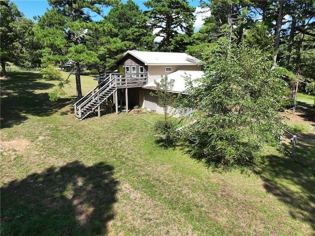 view of yard featuring a wooden deck