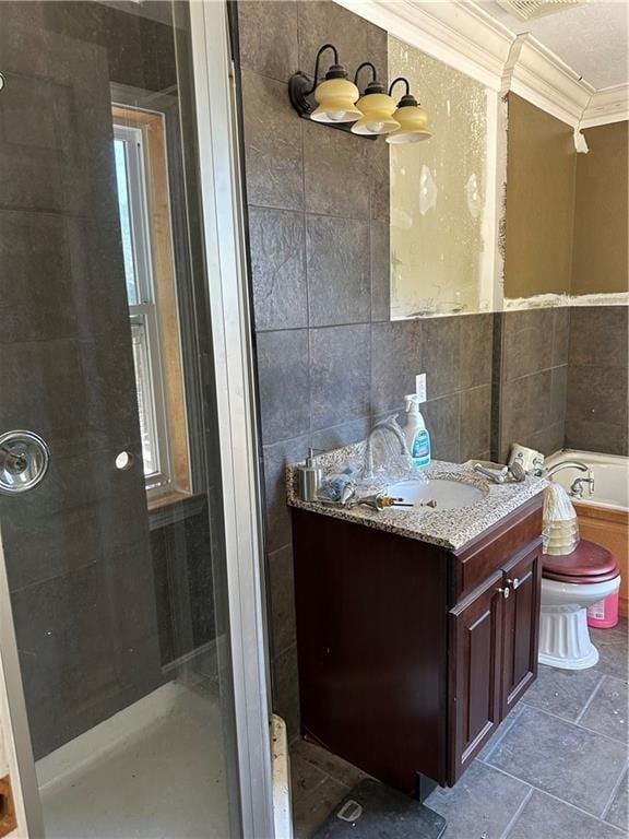 full bathroom featuring toilet, tile walls, crown molding, separate shower and tub, and vanity