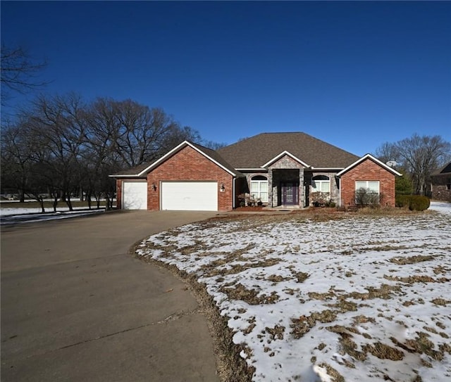 ranch-style home featuring a garage