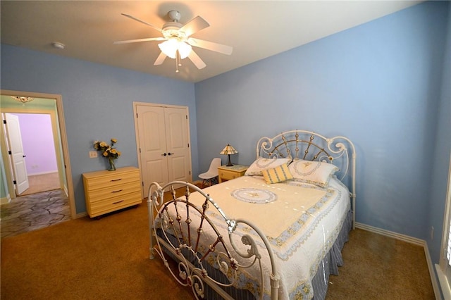 bedroom featuring dark colored carpet and ceiling fan