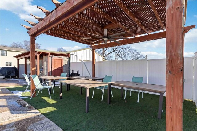 view of patio featuring ceiling fan and a grill