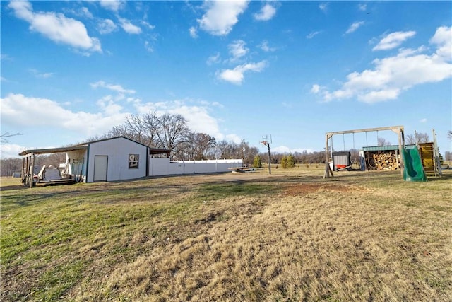 view of yard with a playground