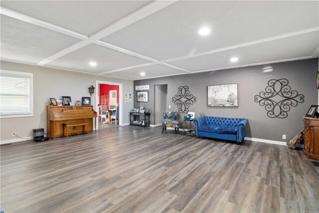 sitting room with hardwood / wood-style flooring and coffered ceiling