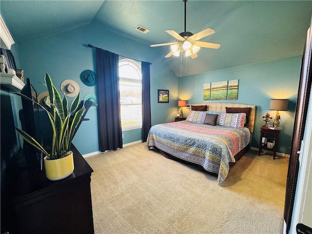 bedroom featuring lofted ceiling, carpet, visible vents, and baseboards