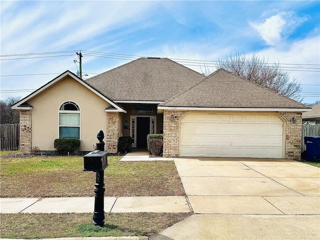 ranch-style house featuring brick siding, stucco siding, concrete driveway, and a garage