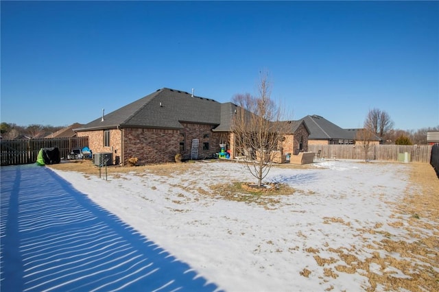 view of snow covered property