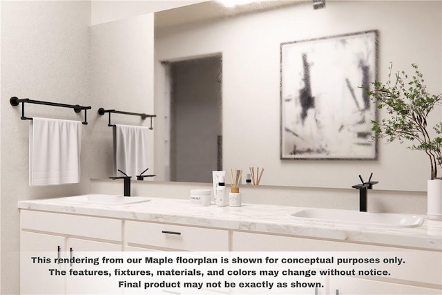 bathroom featuring a sink and double vanity