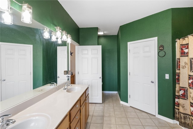 bathroom with vanity and tile patterned flooring