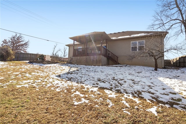 view of snow covered house