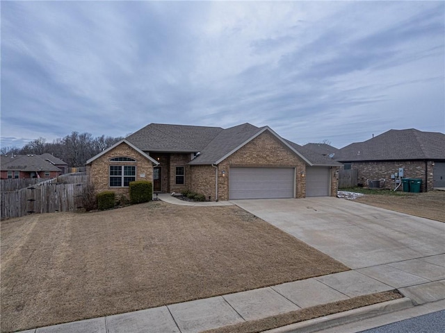 single story home with a garage