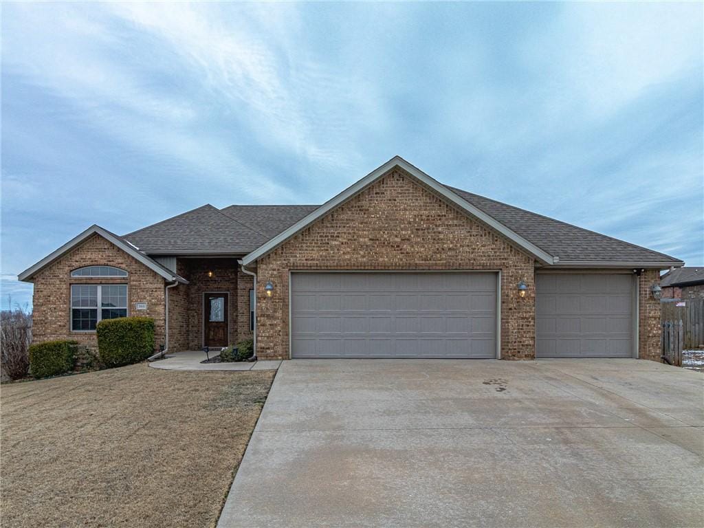 ranch-style home with a garage